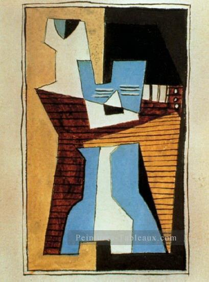 Guitare et compotier sur une table 1920 cubisme Pablo Picasso Peintures à l'huile